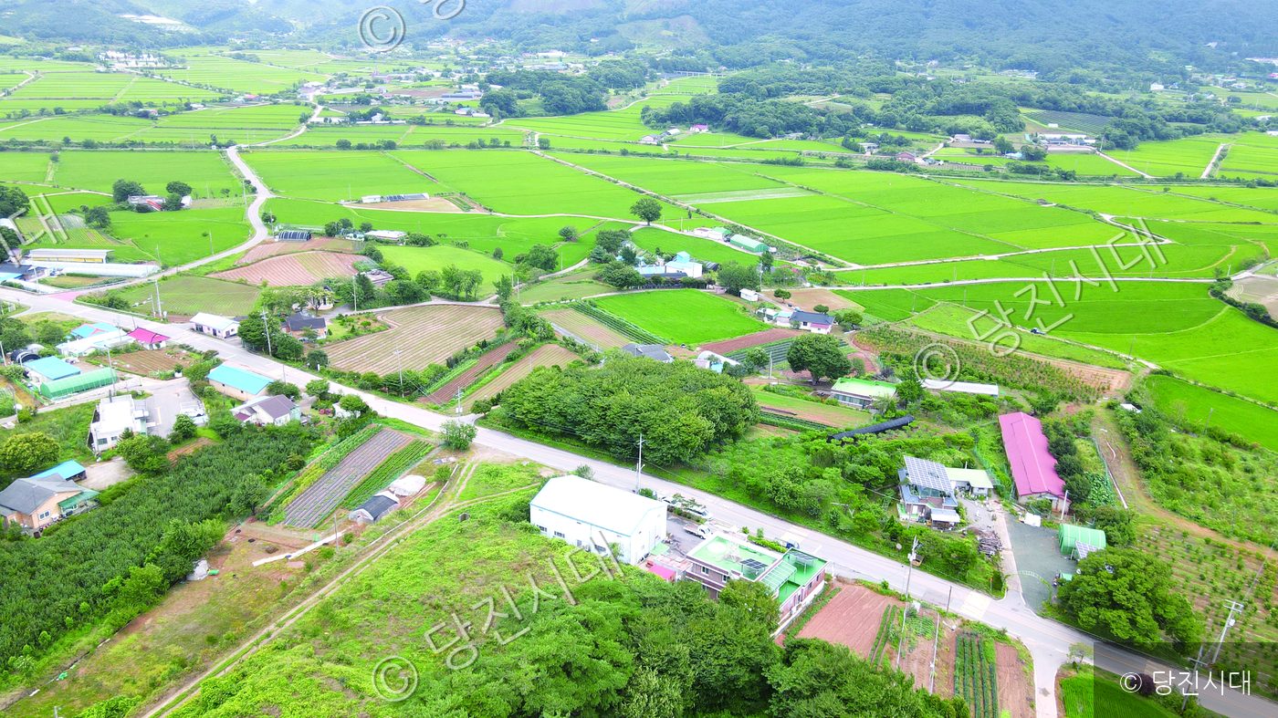 충남 당진시 정미면 우산리의 마을 풍경이 펼쳐져 있다.